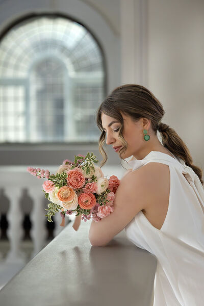 Bride with colourful flowers